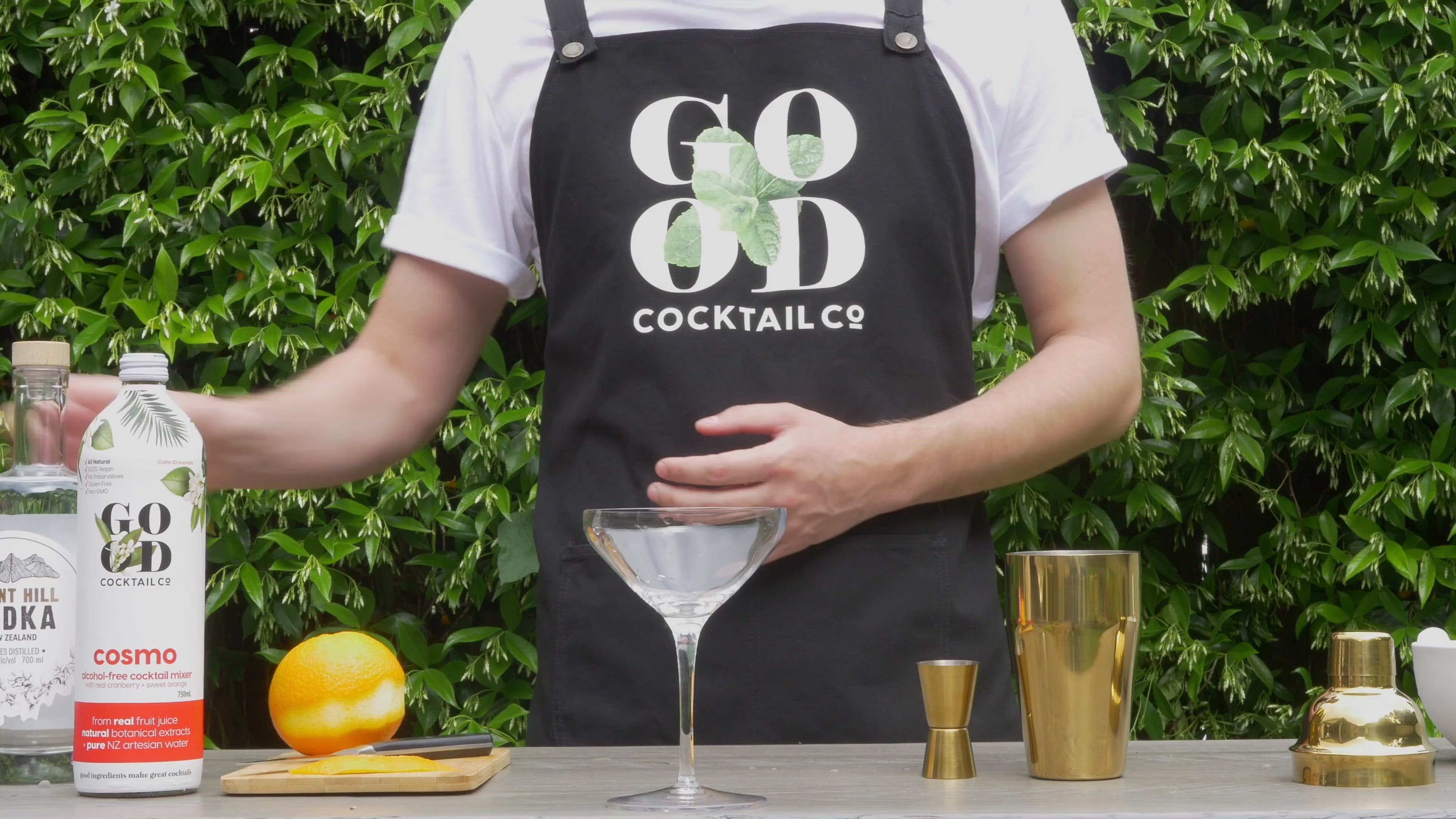 Load video: Video how to show making a cosmo using good cocktail co alcohol free mixer 